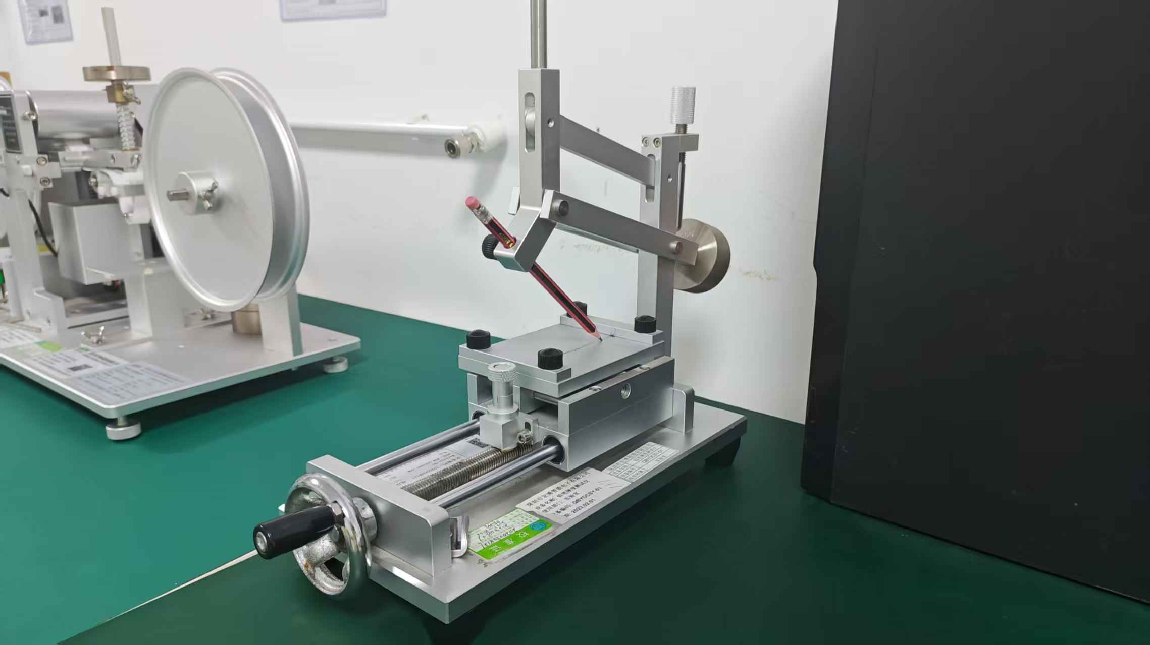 Hardness tester for glass cover and electroplated bezel